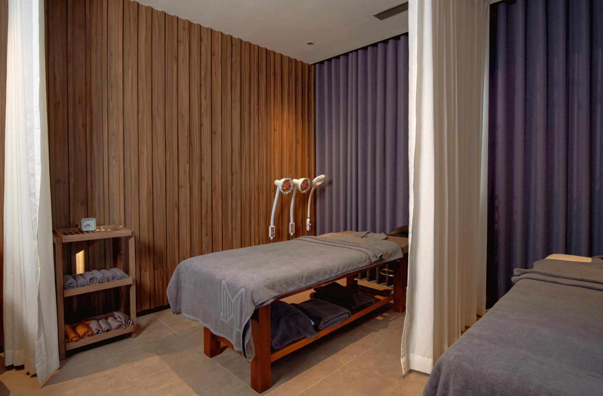 M Hotel Danang Екстериор снимка A massage room at a spa