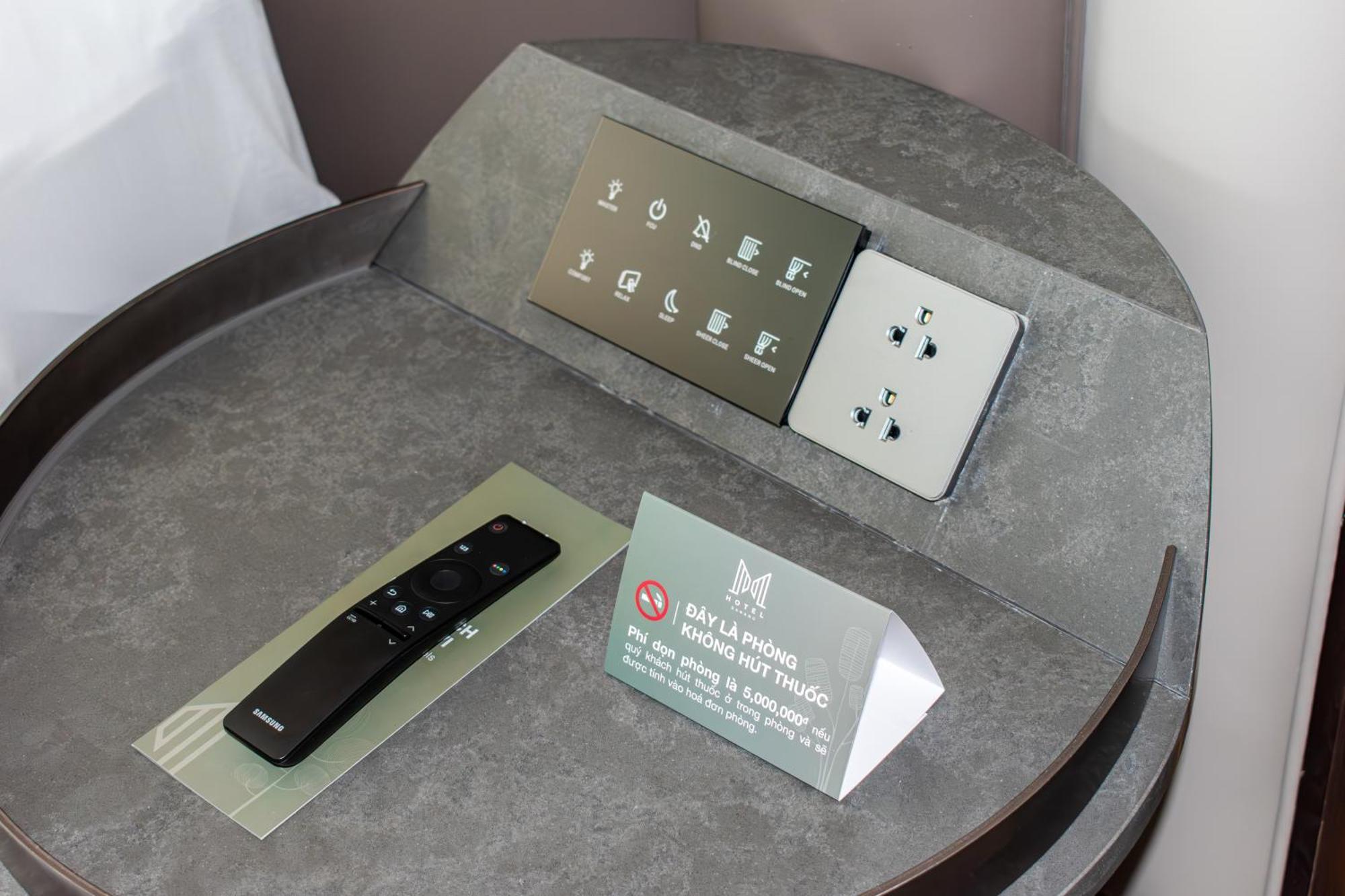 M Hotel Danang Екстериор снимка A room control panel